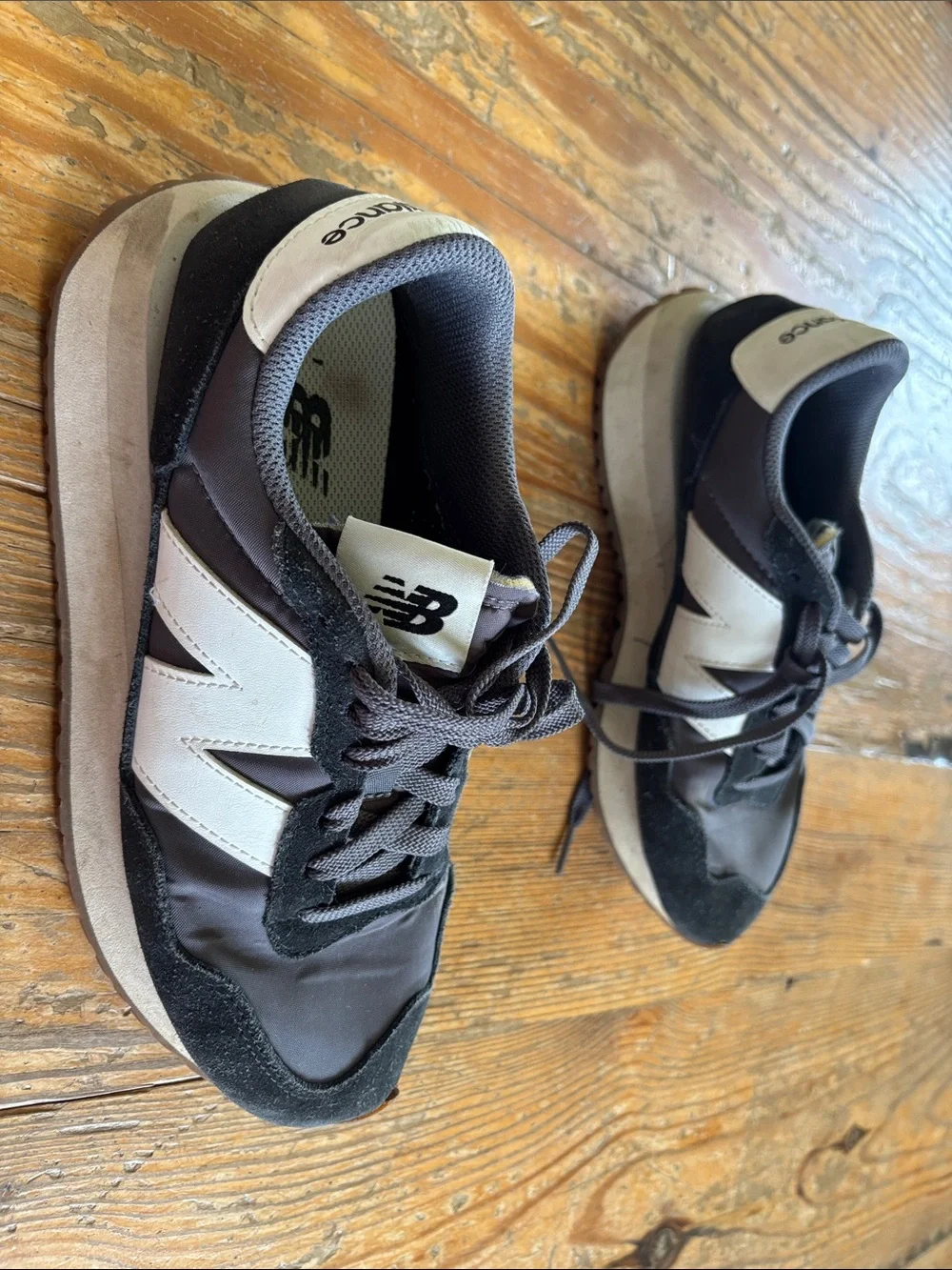 New Balance Women's 237 black and White Runner Sneakers